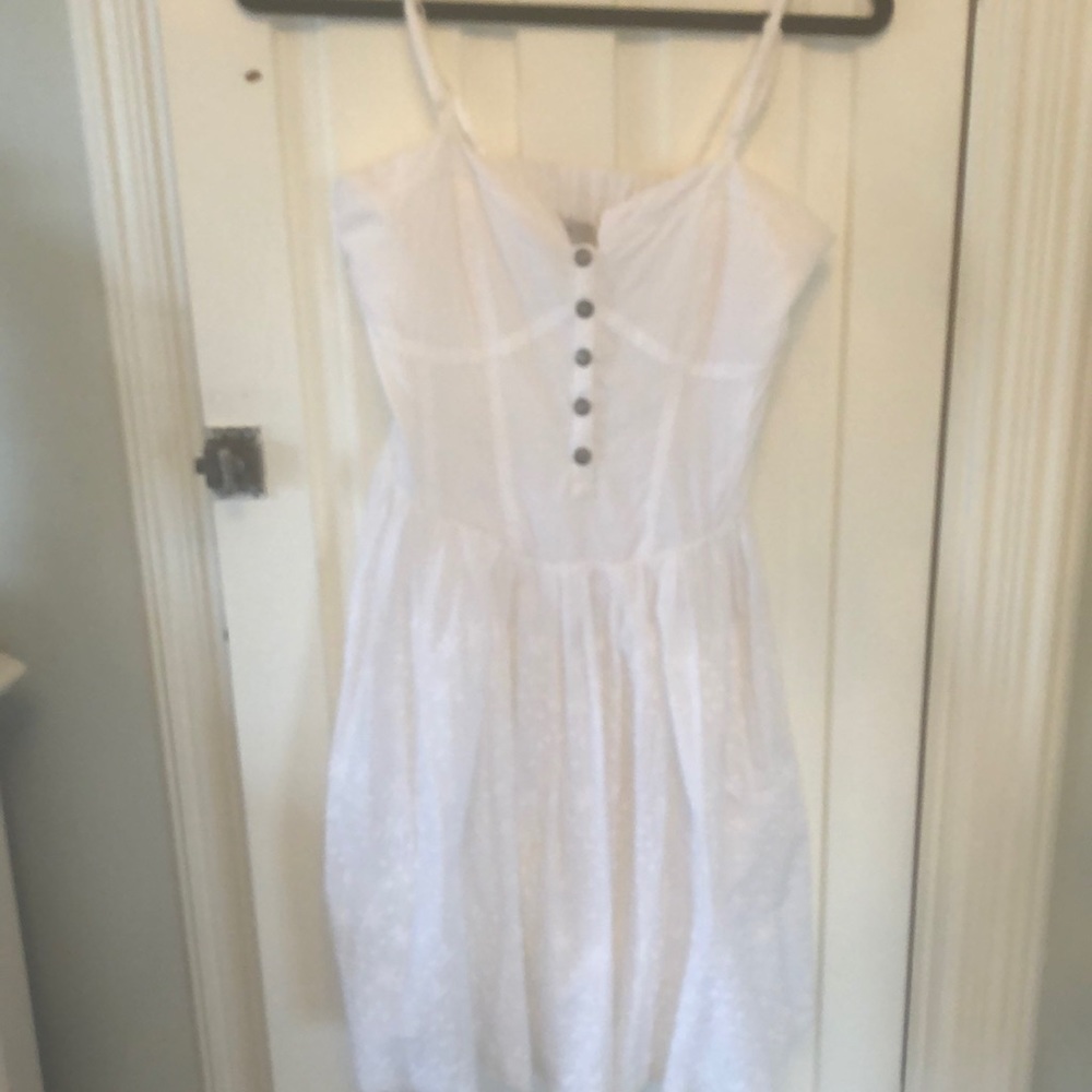 Guess white dress with pockets & open back, want the love shack fancy vibe?😃